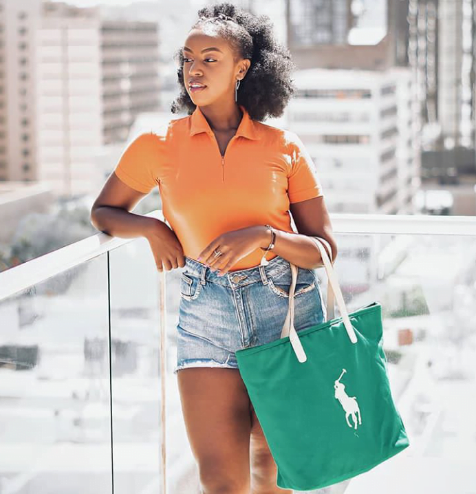 Blue Denim shorts styled by Kenyan dark skin girl